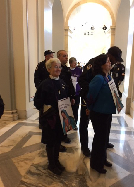 Sister Diane Roche, RSCJ, being arrested