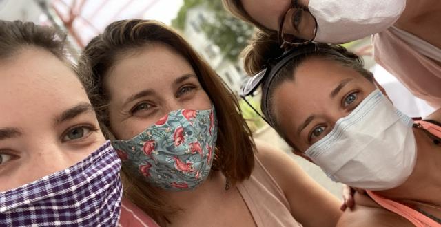 Associate Lori Wilson (right) with her three daughters during the COVID-19 pandemic summer of 2020.